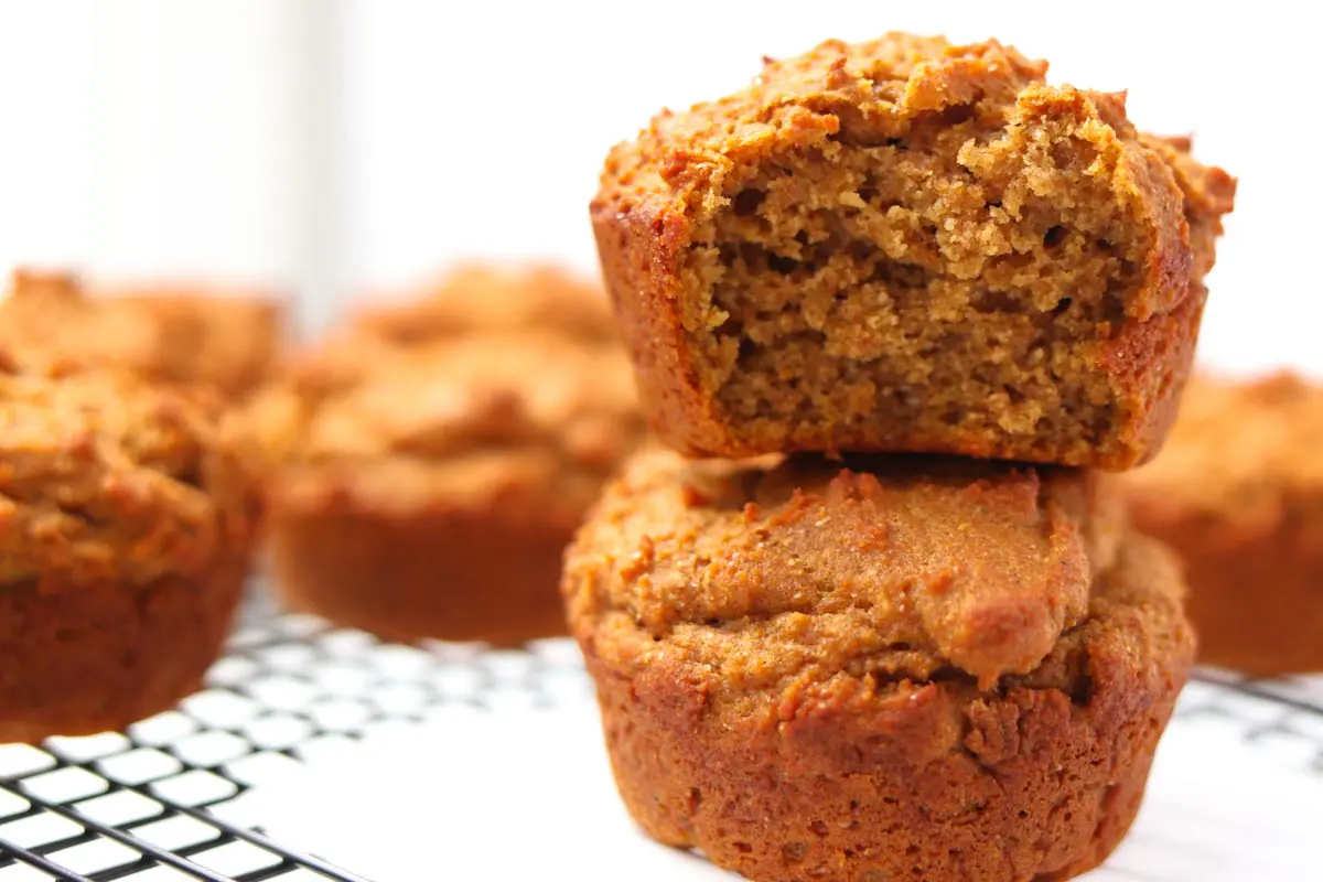 two muffins stacked on top of each other on a baking rack