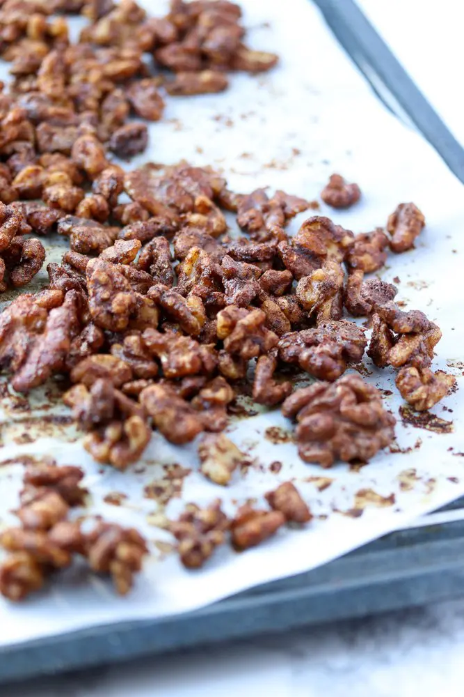 walnuts halves toasted on a baking sheet