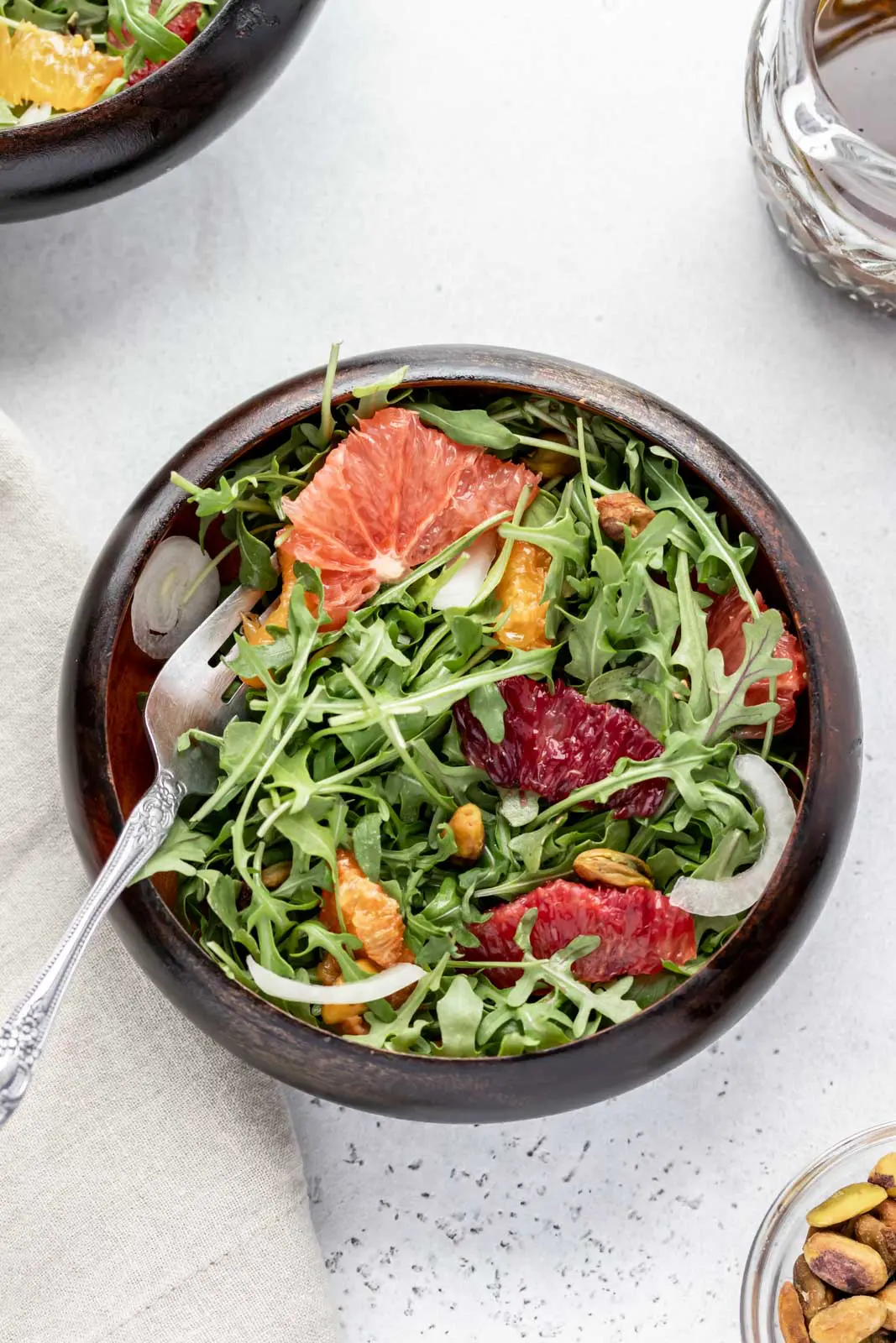 arugula, grapefruit and oranges in a salad bowl