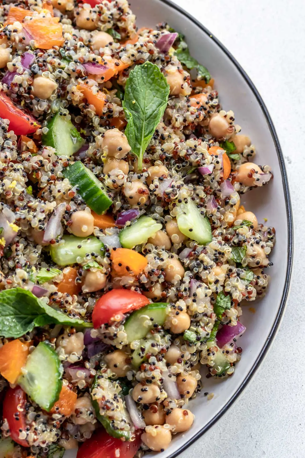 cucumber chickpeas and quinoa in a bowl