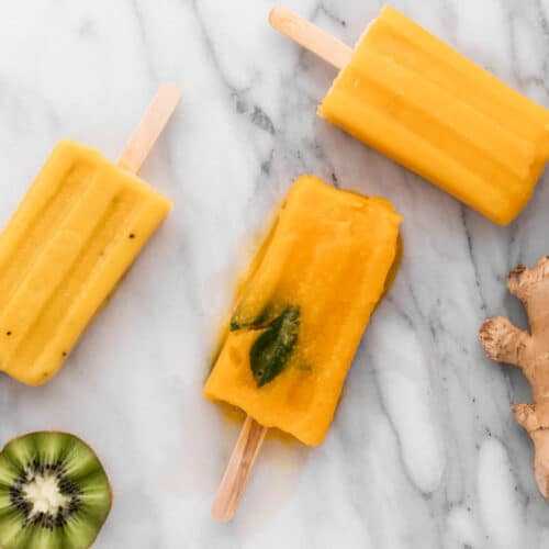 3 mango popsicles with kiwi and mint and ginger