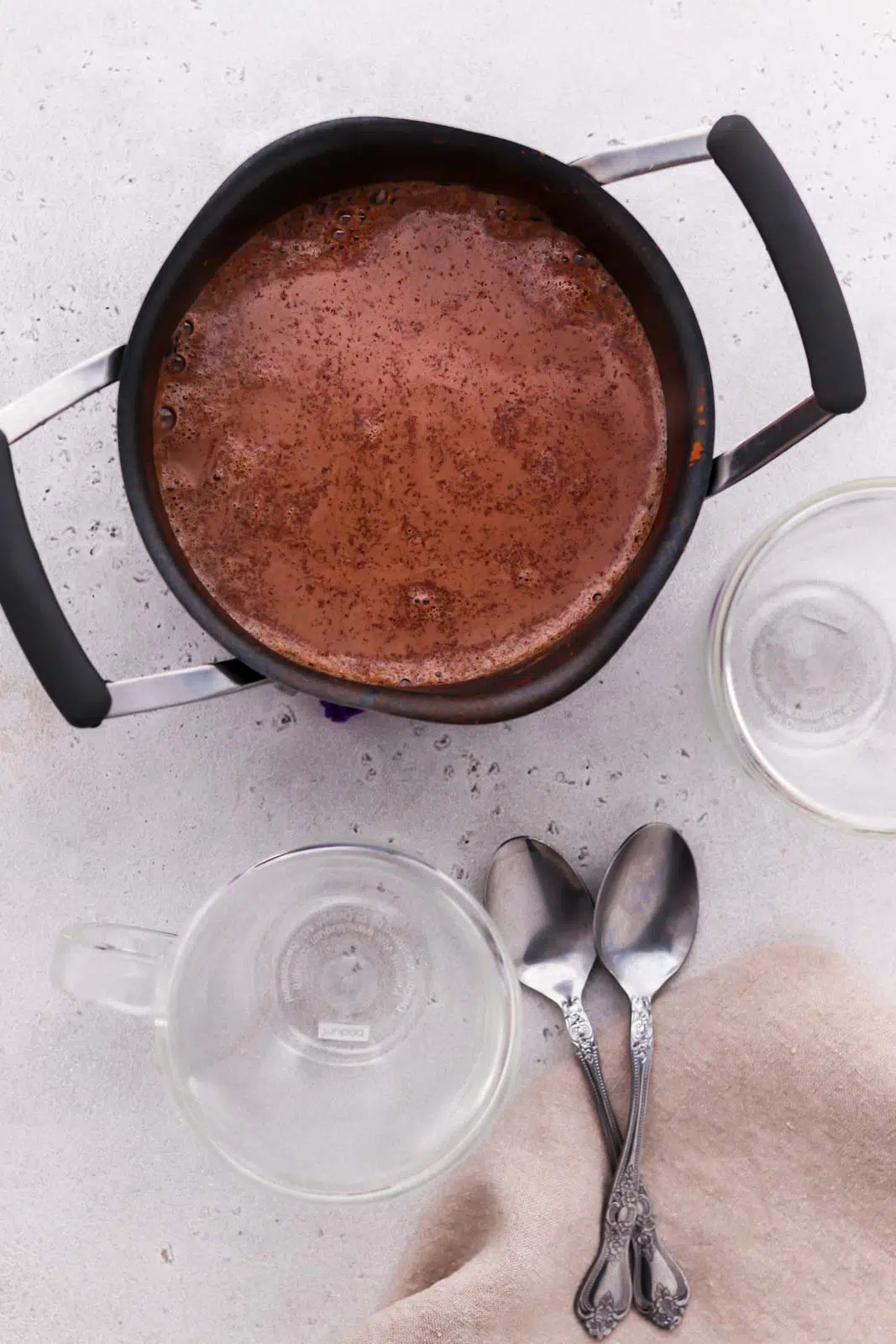 pot of hot chocolate with cinnamon