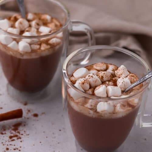 mugs of cacao powder hot chocolate
