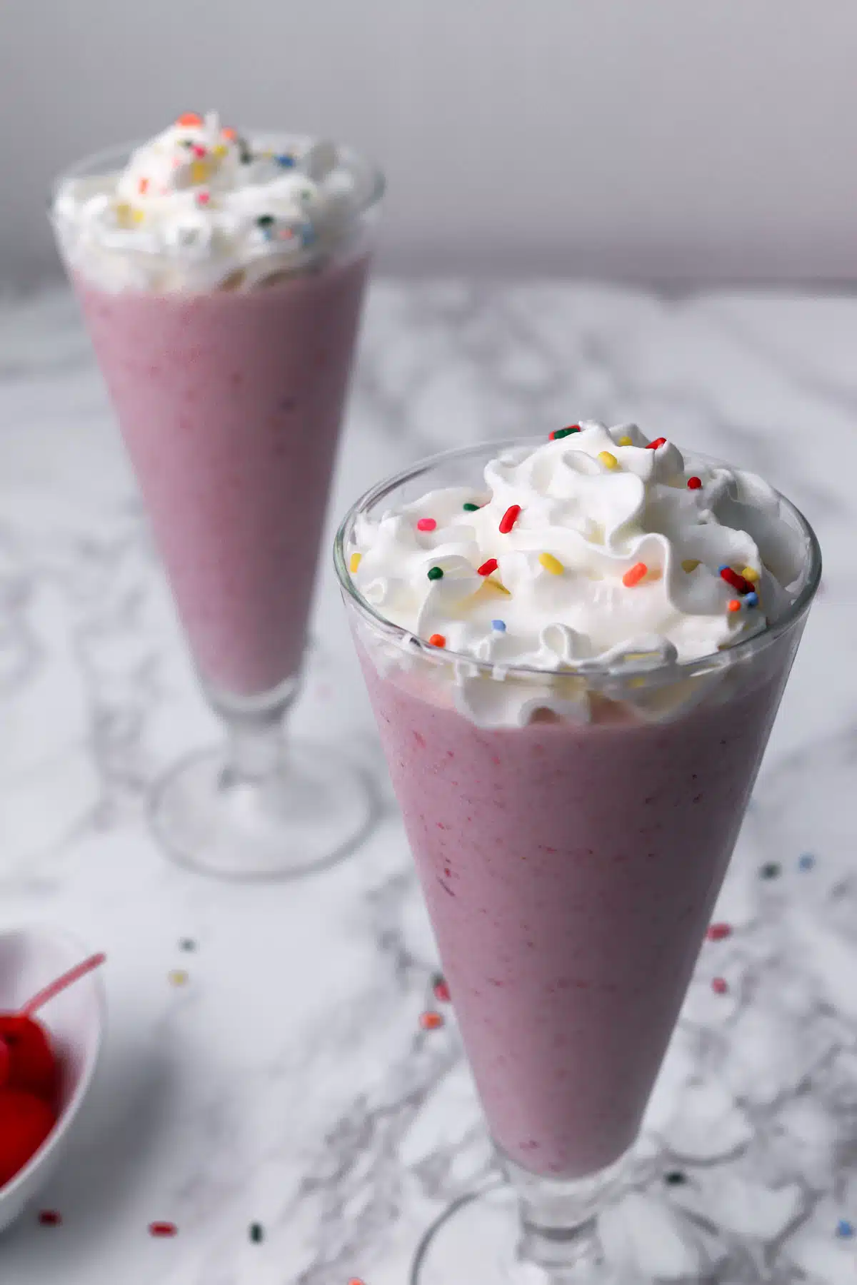 milkshake with whipped cream and sprinkles