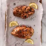 lavender lemon chicken on a baking sheet