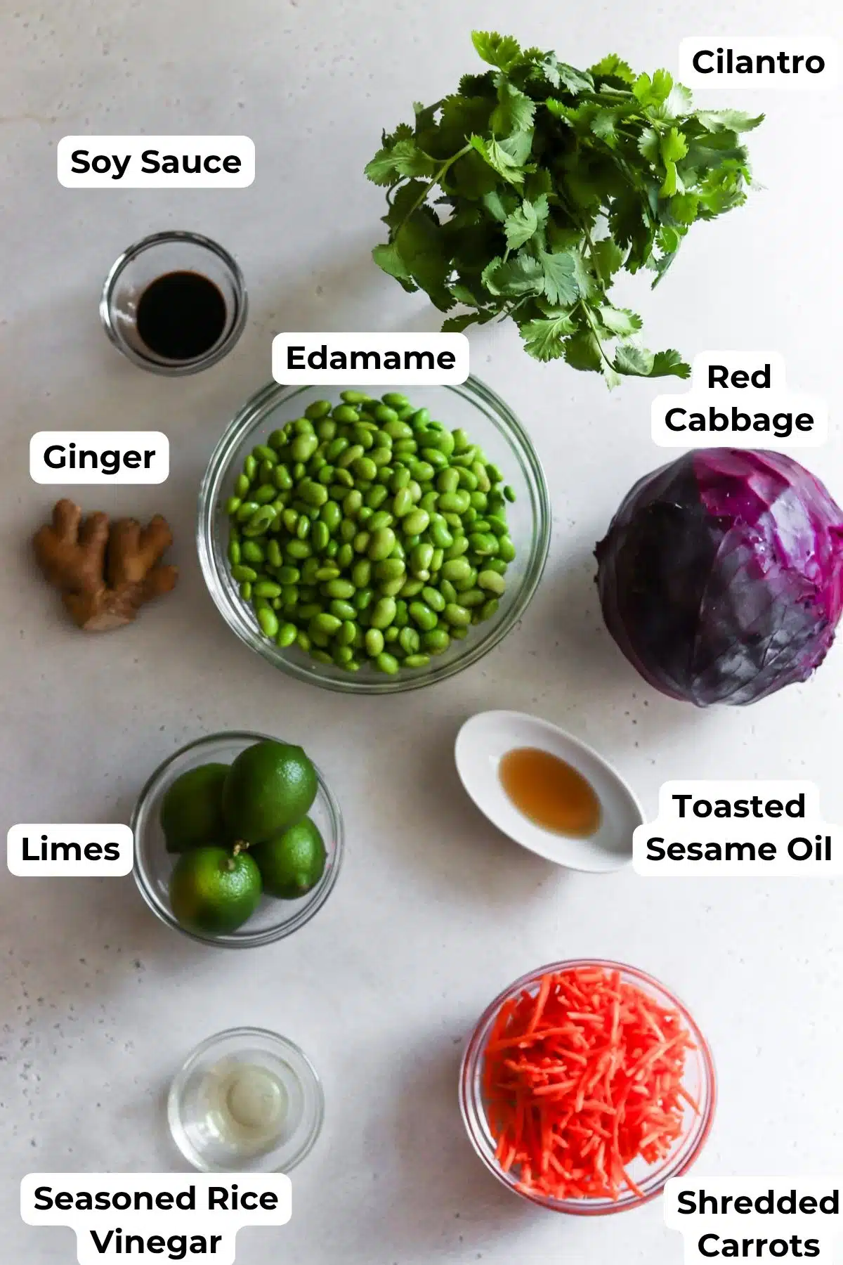 Ingredients to make edamame salad on display.