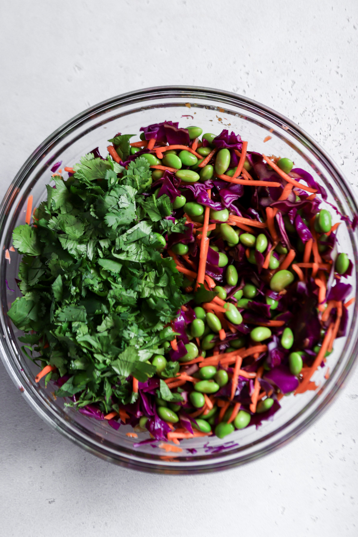 Chopped cilantro gets added to the edamame salad.